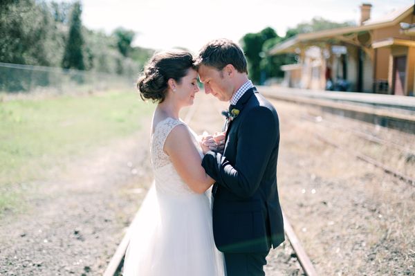 Australian Beach Wedding, Bride and Groom, Embrace, Hand Hold, Train Tracks