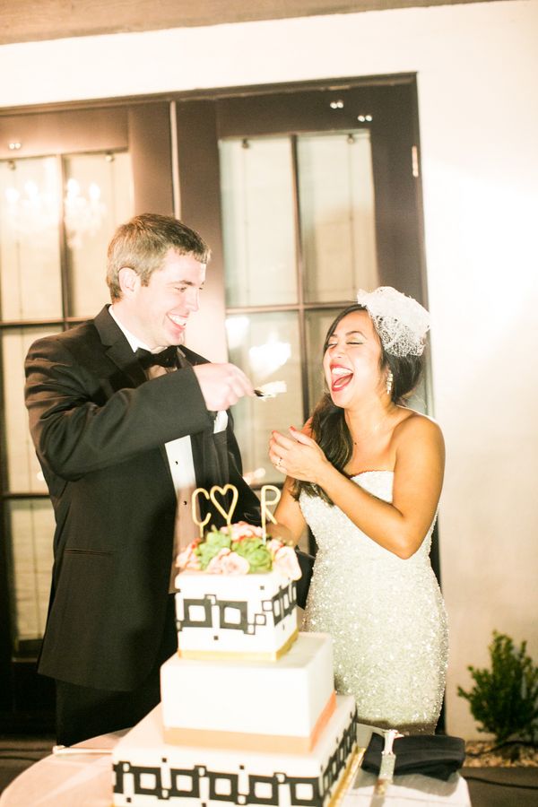 bride, groom, wedding cake, cutting the cake, birdcage veil, bow tie, strapless dress, sequins , cake topper, 3 tiered cake