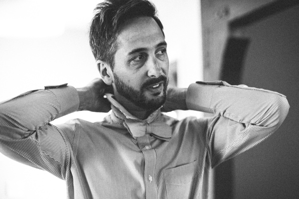 groom, black and white, bowtie, pre ceremony, getting ready
