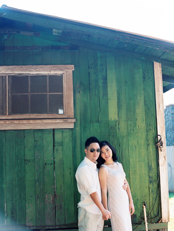 hawaiin engagement session, hawaii, couple, love, engaged, beach, ocean, surf, surf boards, kiss, couple