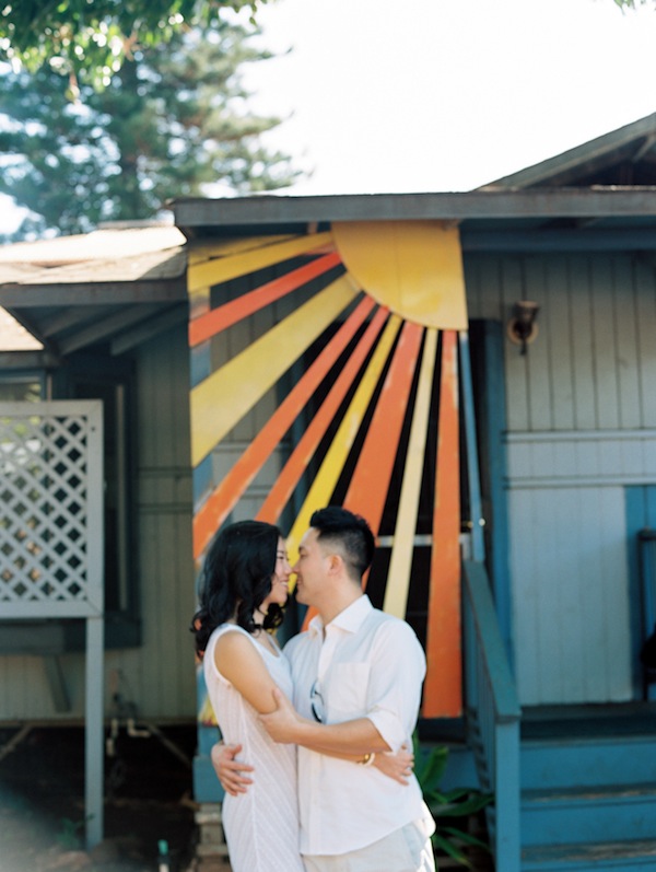 hawaiin engagement session, hawaii, couple, love, engaged, beach, ocean, surf, surf boards, kiss, couple