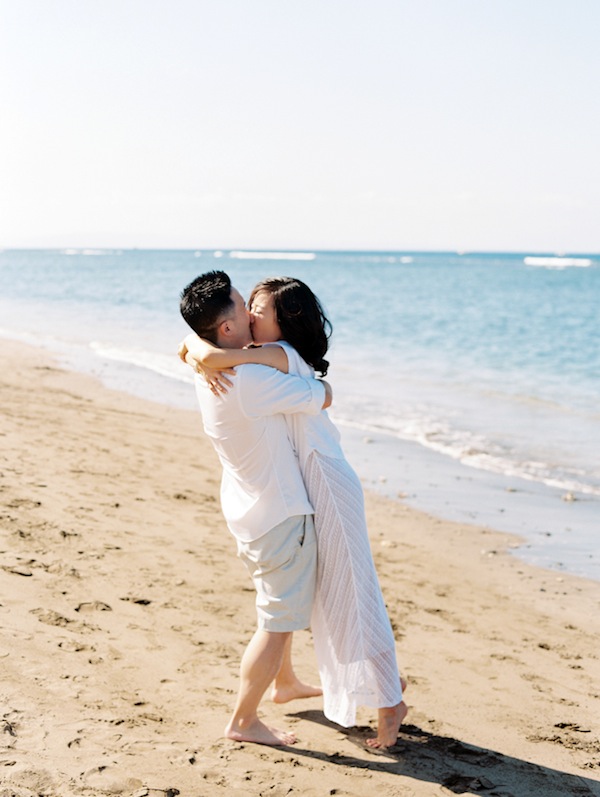 hawaiin engagement session, hawaii, couple, love, engaged, beach, ocean, surf, surf boards, kiss, couple