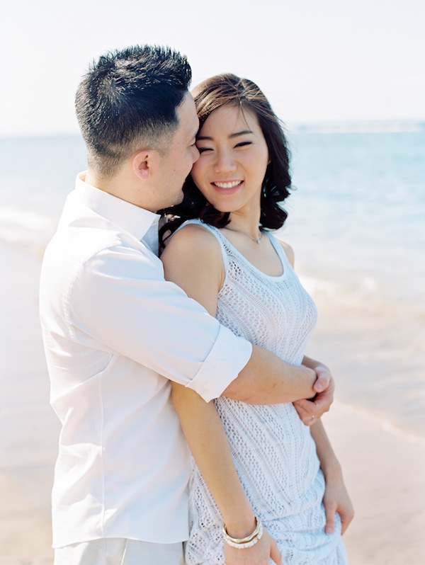 hawaiin engagement session, hawaii, couple, love, engaged, beach, ocean, surf, surf boards, kiss, couple