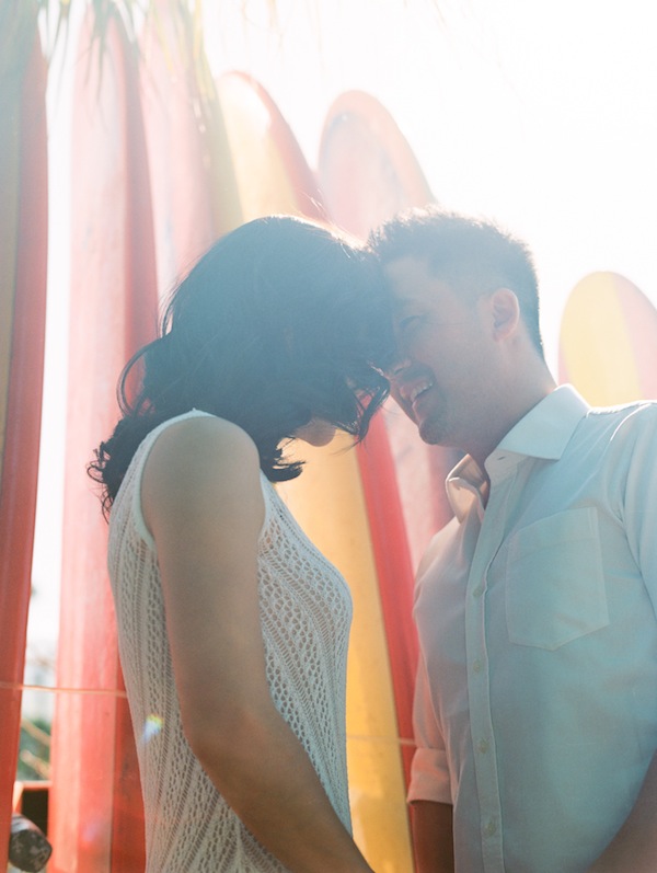 hawaiin engagement session, hawaii, couple, love, engaged, beach, ocean, surf, surf boards, kiss, couple