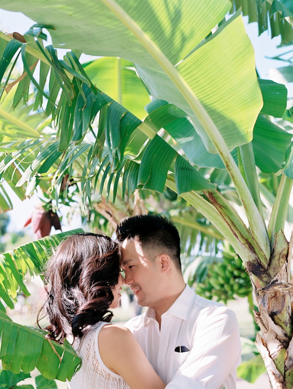 hawaiin engagement session, hawaii, couple, love, engaged, beach, ocean, surf, surf boards, kiss, couple
