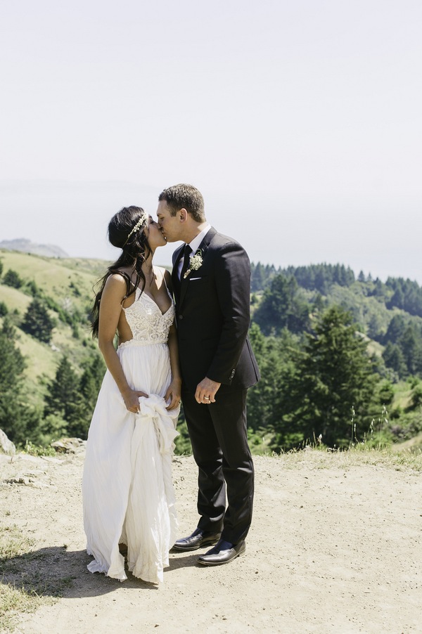 bride, elopement, mountain, floral headband, bohemian, kiss, just married, newlyweds