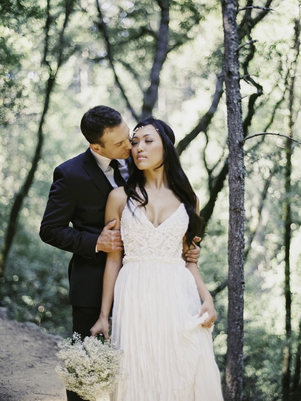 bride, elopement, mountain, floral headband, bohemian, kiss, love, newlyweds