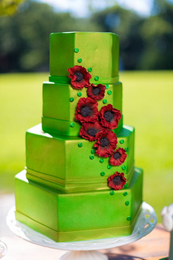 Wizard of Oz Wedding Inspiration Shoot, wedding cake, green cake, red flowers, 4 layer cake Inspired by This Wizard of Oz Wedding Inspiration Shoot by Tami Melissa Photography