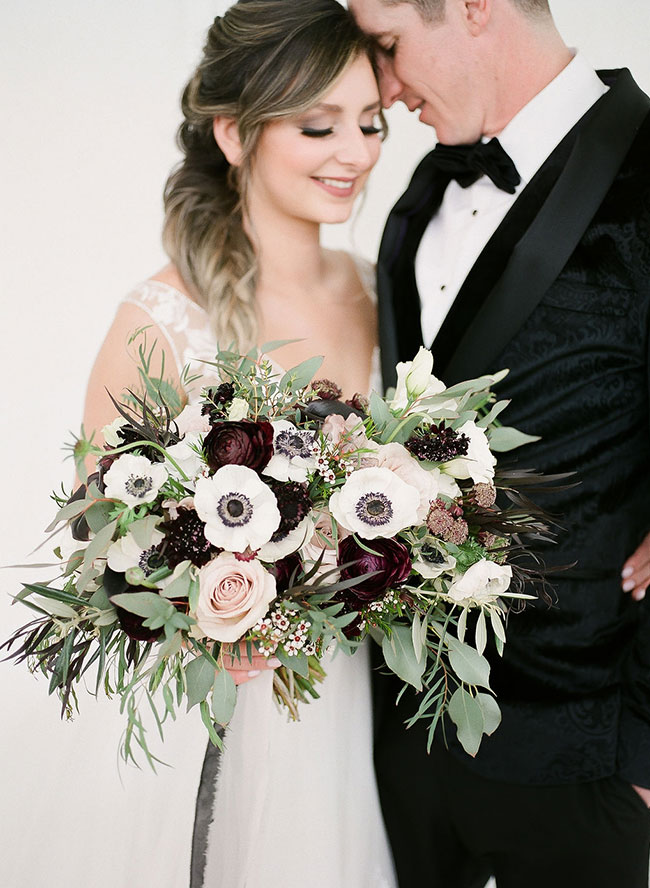 A Chic Matte Black Barn Wedding with Greenery - Inspired by This