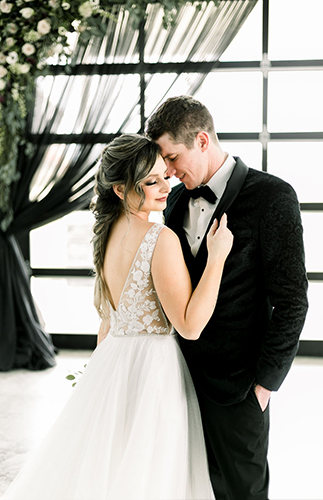 A Chic Matte Black Barn Wedding with Greenery - Inspired by This