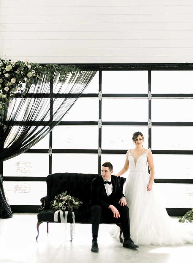 A Chic Matte Black Barn Wedding with Greenery - Inspired by This