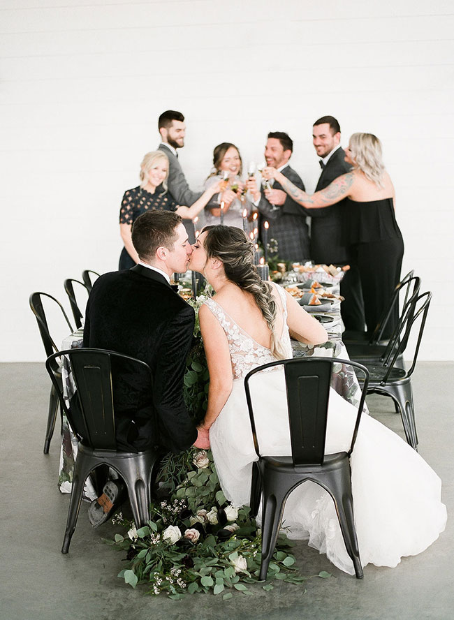 A Chic Matte Black Barn Wedding with Greenery - Inspired by This